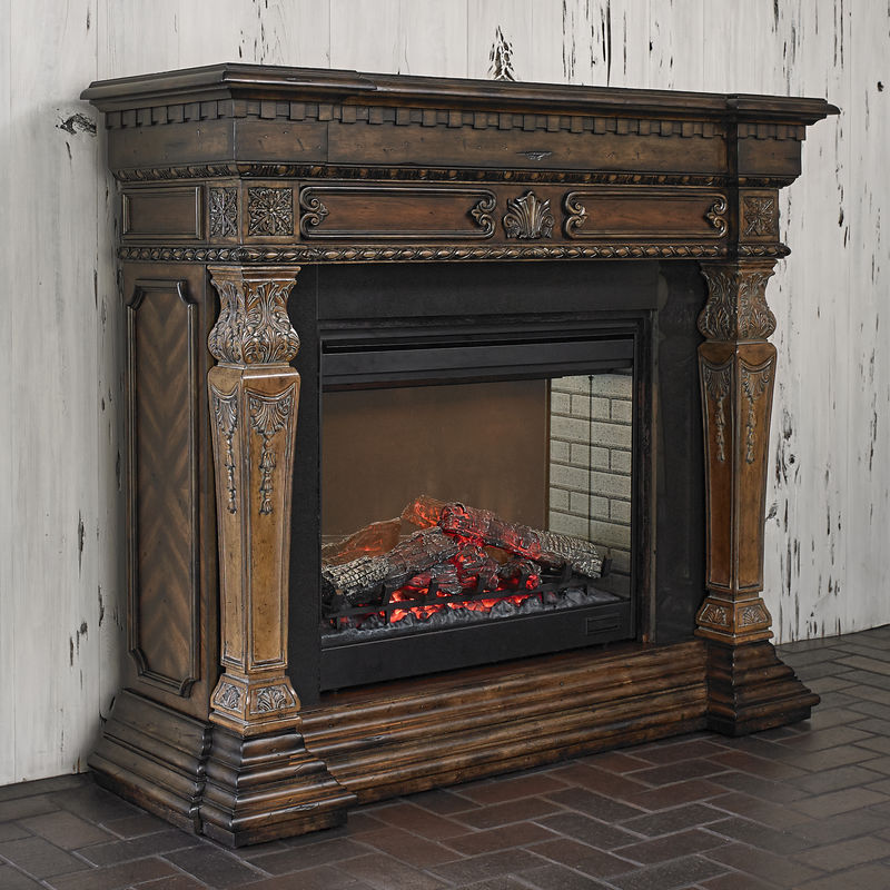 St. Andrews Electric Fireplace    Pine Wood Construction  Two Tone Finish  Ornately Carved  30 Firebox is Surrounded by Granite  Features OnOff Remote  Two Stage Heat Control  58 Wide x 20 Deep x 51 High  Free Delivery